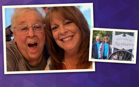 A couple who were treated with Proton Therapy smiling at the camera.